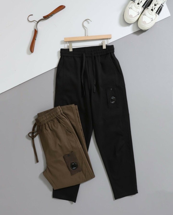 C.P 컴퍼니  렌즈 포켓 밴딩 팬츠 