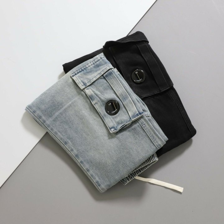 C.P 컴퍼니  루즈핏 멀티포켓 렌즈 워시드 팬츠 