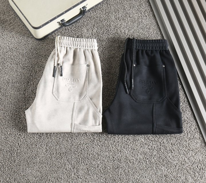 프라다  휴먼멀티 엠보자수로고 세미와이드 밴딩팬츠