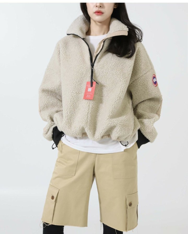 캐나다구스  베이지 하프 짚업 스웨터